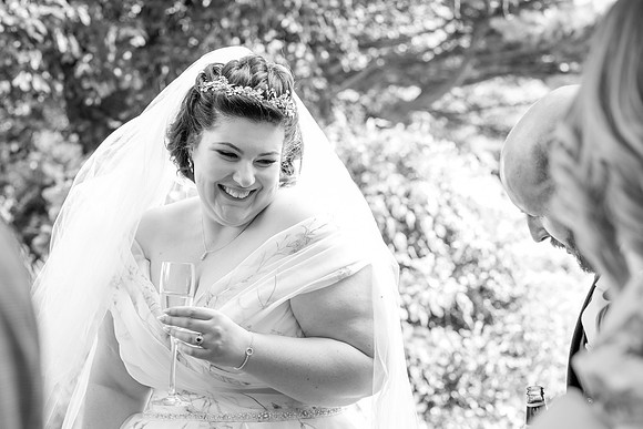 Candid moment of bride having fun